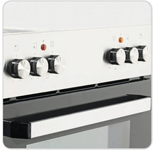 Close-up van een fornuis met draaiknoppen