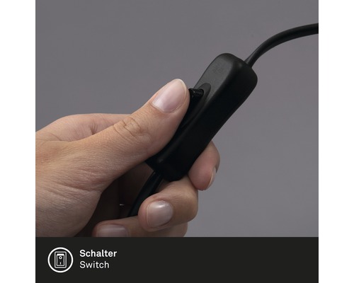 Close-up van een hand die een schakelaar op een kabel bedient