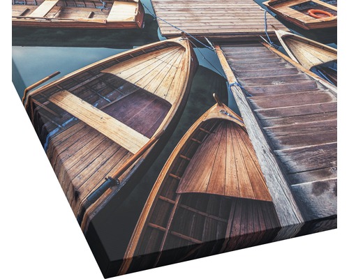 Canvas schilderij met houten boten aan een steiger