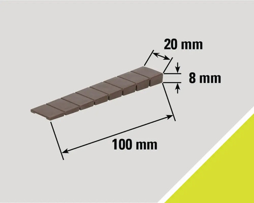 Afbeelding van een rij straatstenen met maatvoering