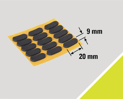 Zelfklevende meubelglijders met afmetingen van negen bij twintig millimeter op een draagvel.