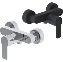 Twee wastafelkranen van Laufen, één verchroomd en één in een donkere uitvoering