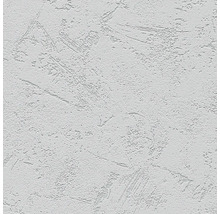 Close-up van een witte muur met stucwerktextuur