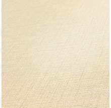 Close-up van een beige vinylbehang met fijne textuur