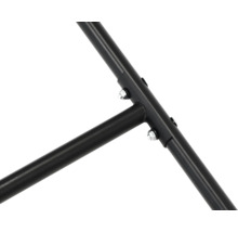 Detailopname van een metalen frame, vastgemaakt met schroeven.