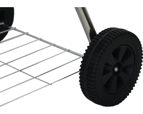 Gedetailleerd beeld van wiel en opbergrooster van een barbecuekar