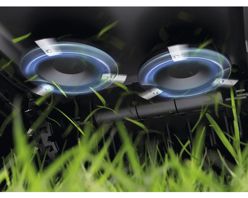 Close-up van de maaifunctie van een grasmaaier met roterende messen