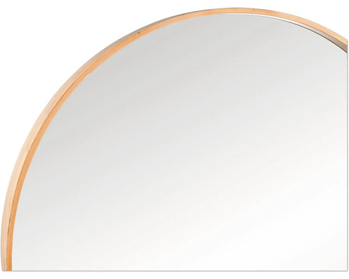 Detail van een ronde spiegel met houten frame