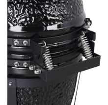 Detailopname van een keramische barbecue met veermechanisme