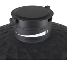 Close-up van de ontluchtingsklep van een barbecue met een instelindicator