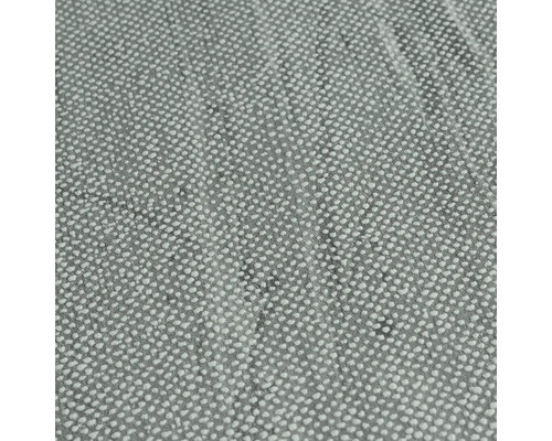 Close-up van een textiel met stippenpatroon