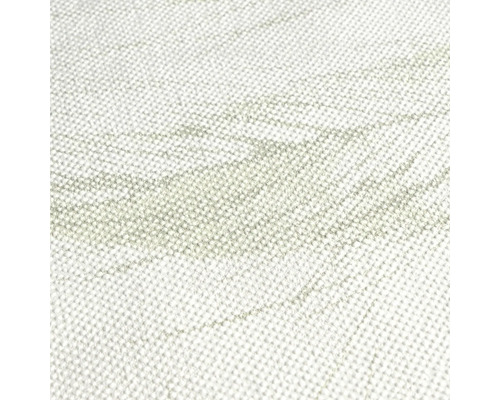 Detailopname van een lichtgekleurd tapijt met patroon