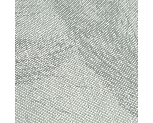 Close-up van een grijs textielbehang met stippenpatroon