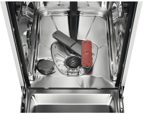 Interieur van een vaatwasser met sproeiarm, zeef en doseerkamer