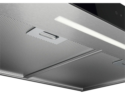 Gedetailleerd aanzicht van een afzuigkap met metalen vetfilter en ledverlichting