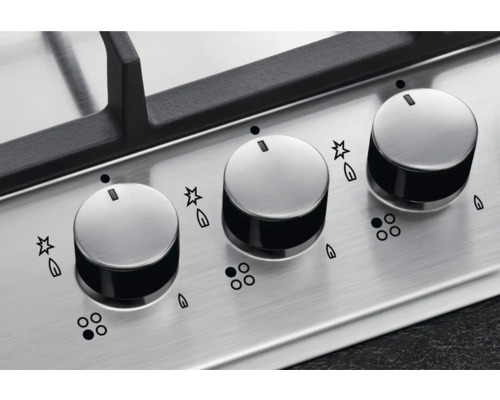 Detailopname van een gasfornuis met draaiknoppen