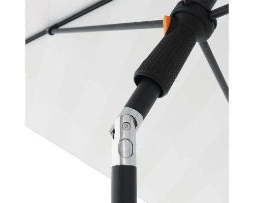 Detail van een parasol met handvat en scharnierstuk