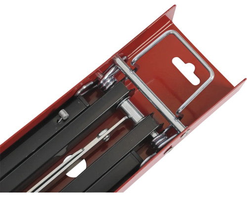 Tegelsnijder in rode transportbox