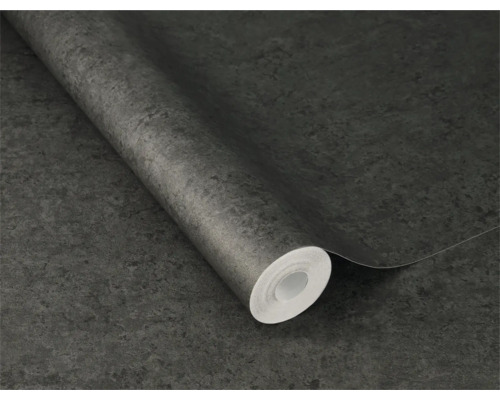 Een rol behang met een steenmotief