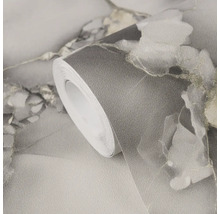 Rol vliesbehang met abstract bloemenpatroon en gestructureerd oppervlak voor wanddecoratie.