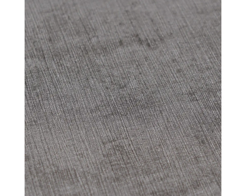 Detailweergave van een grijs gestructureerd oppervlak met fijne lijnen.