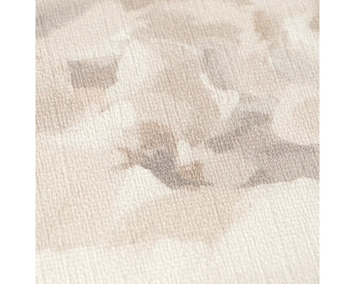 Detailopname van vliesbehang met een abstract aquarelmateriaal en fijne oppervlaktestructuur.