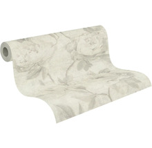 Behangrol met groot bloemenpatroon en bladmotieven.