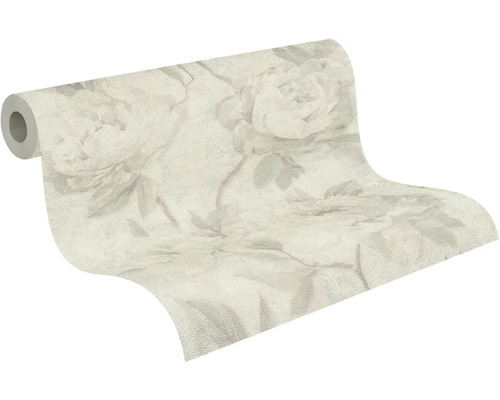 Behangrol met groot bloemenpatroon en bladmotieven.