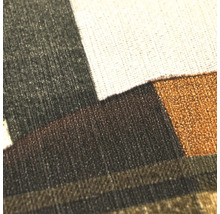 Detailopname van behang met een gestructureerd oppervlak en een geometrisch patroon.