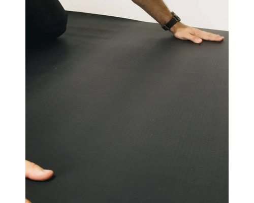 Zwarte vloermat met persoon