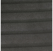 Close-up van een gestructureerd schuimoppervlak met horizontale groeven.