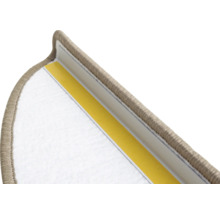 Detail van een trapmat met plakstrip