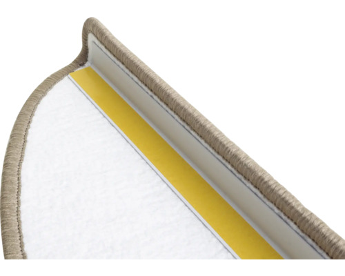 Detail van een trapmat met plakstrip