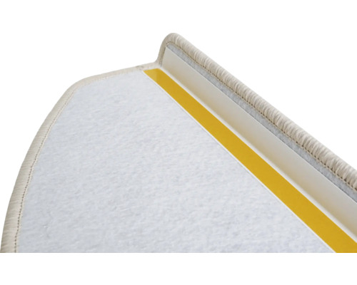 Detail van een trapmat met plakband voor bevestiging