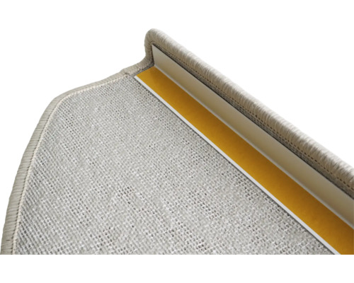 Detail van een trapmat met bevestigingsstrip