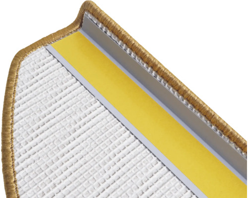 Detail van een trapmat met bevestigingsstrip