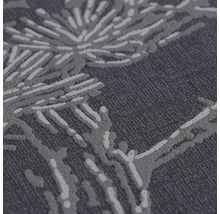 Detailopname van een tapijt met plantenpatroon