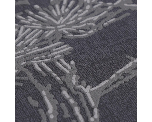 Detailopname van een tapijt met plantenpatroon