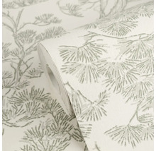 Vliesbehang op rol met botanisch dennentakkenpatroon in grijs en wit.