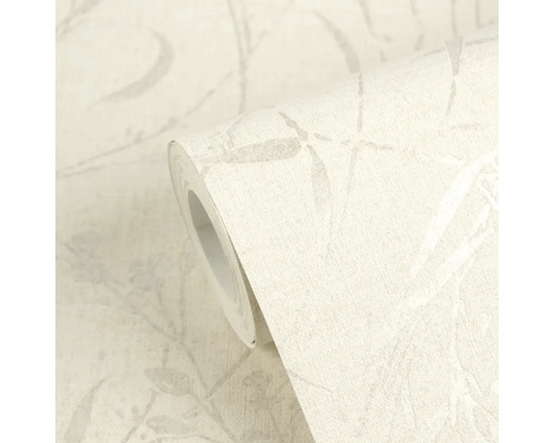 Vliesbehang op rol met een gestructureerd oppervlak en een subtiel blad- en takkenpatroon.