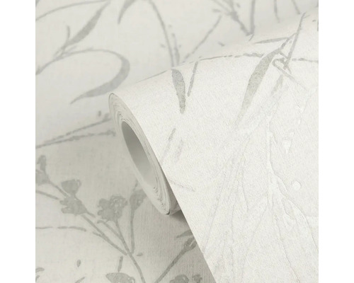 Rol vliesbehang met grijs botanisch patroon van takken en bloemen en textielstructuur.