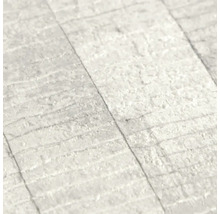 Close-up van een wit vinylbehang met steenmotief