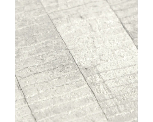 Close-up van een wit vinylbehang met steenmotief