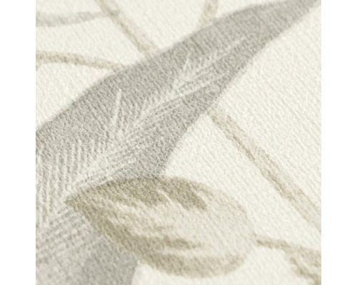 Close-up van een gestructureerd behang met plantmotieven.