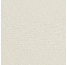 Close-up van een lichtgekleurd, gestructureerd behang