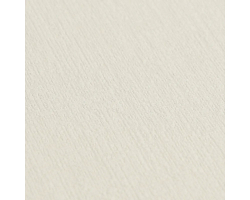 Close-up van een lichtgekleurd, gestructureerd behang