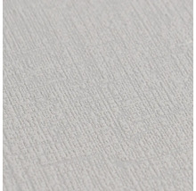 Detailopname van structuurbehang met een verticale korrel, overschilderbaar.