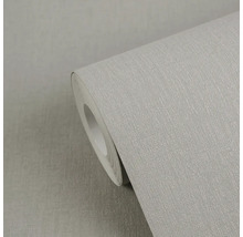 Rol vliesbehang met fijne textielstructuur.