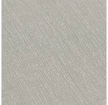 Gestructureerd behang met een fijne, korrelige oppervlaktestructuur.