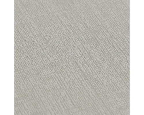 Gestructureerd behang met een fijne, korrelige oppervlaktestructuur.